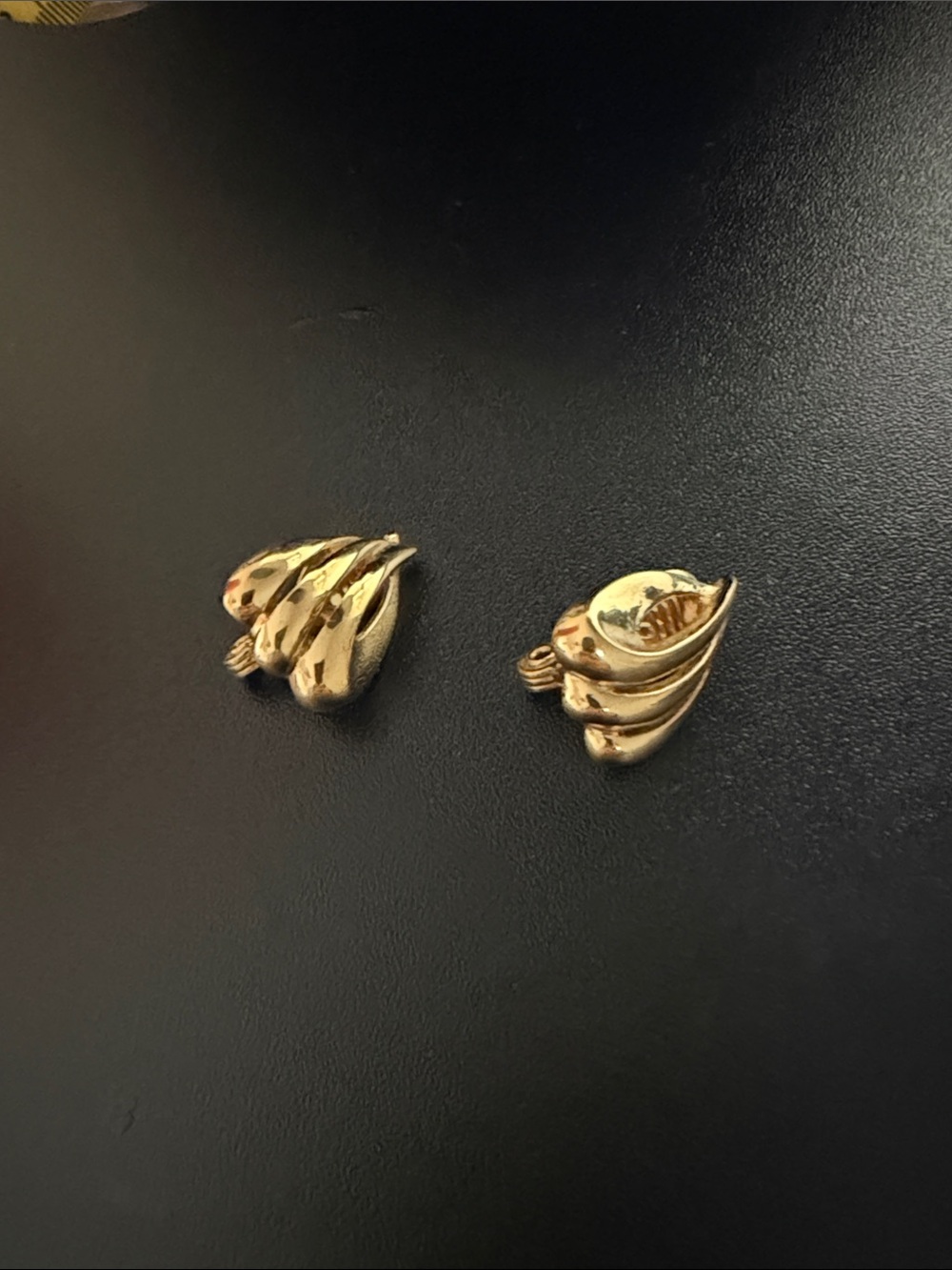Elegant Gold-Tone Clip-On Earrings - Smooth Curved Design